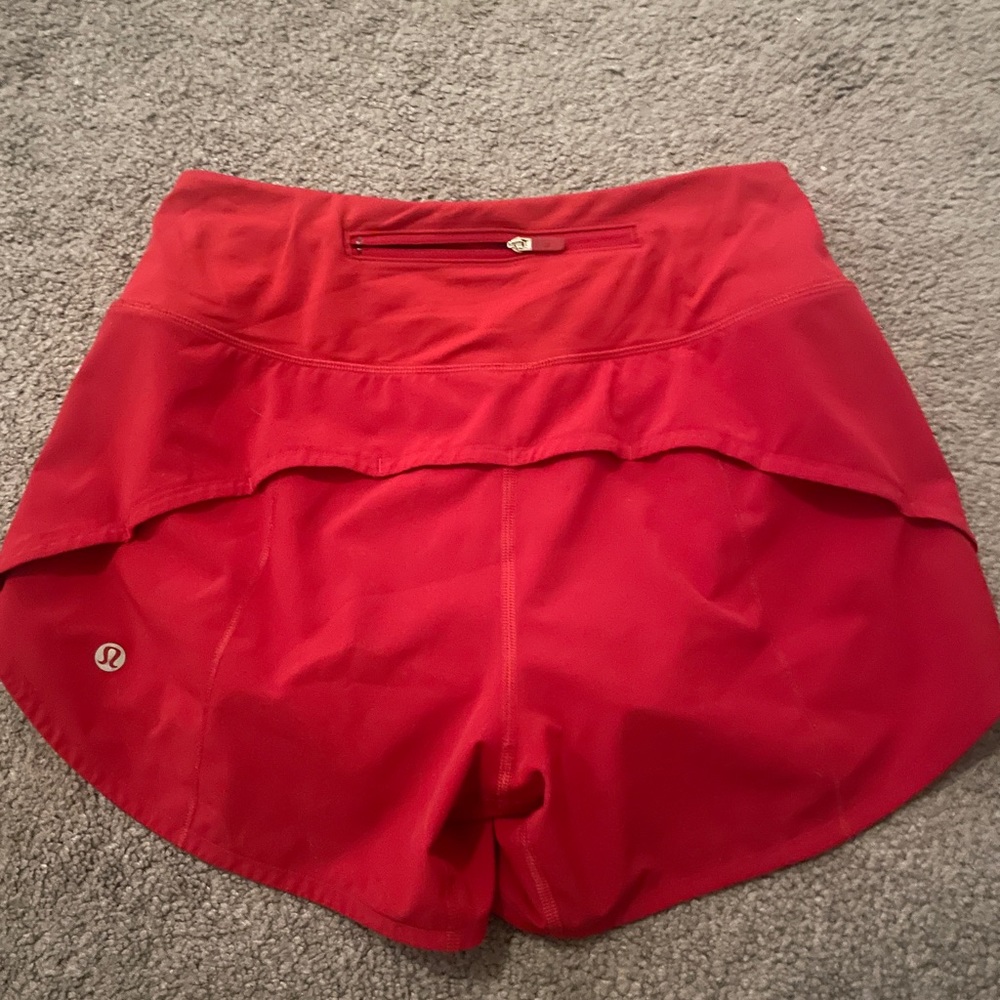 red lululemon shorts